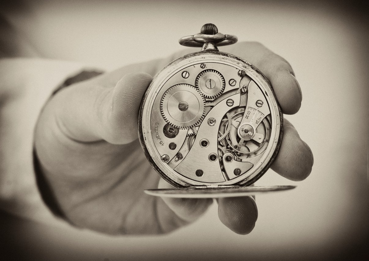 Antique pocket watch mechanism.